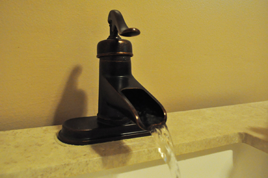 real estate - bathroom waterfall faucet