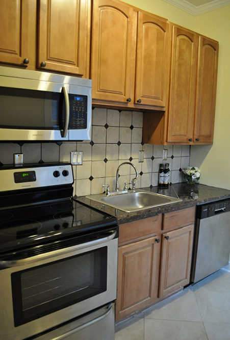 Granite tile kitchen countertops in a rental property