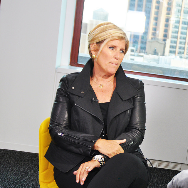 Photo of Suze Orman in yellow chair