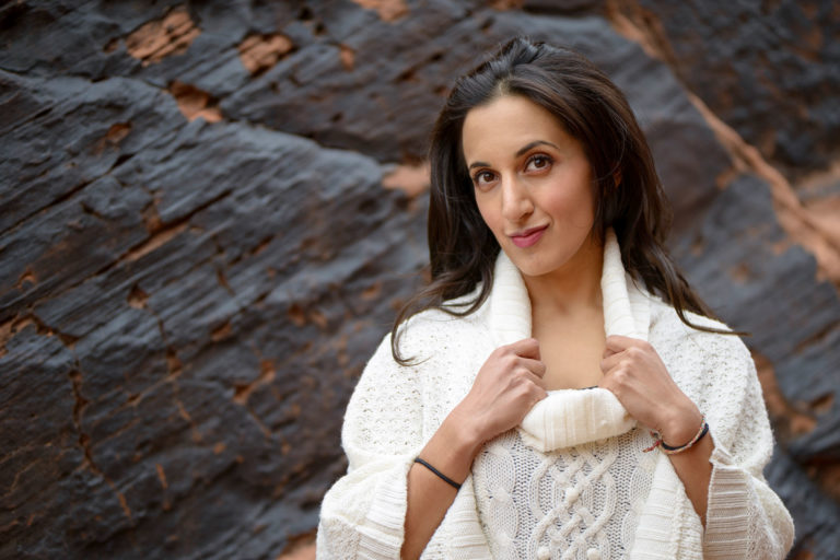 Photo of Paula Pant in white sweater