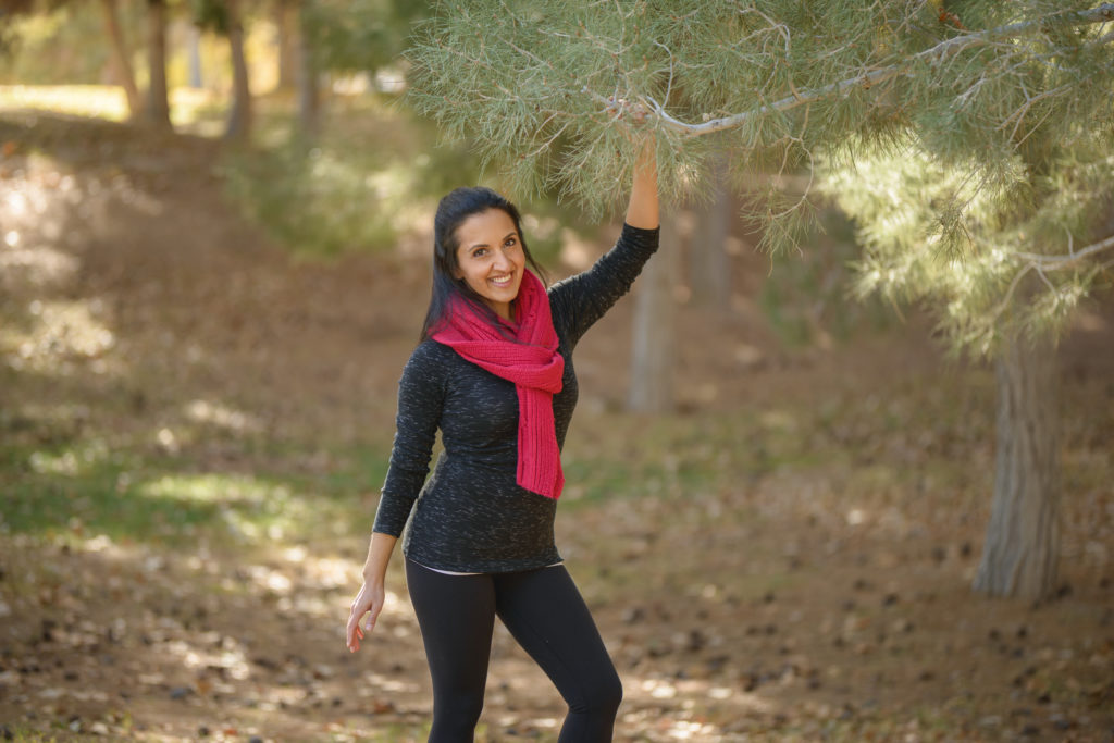 Second photo of Paula in forest with red scarf