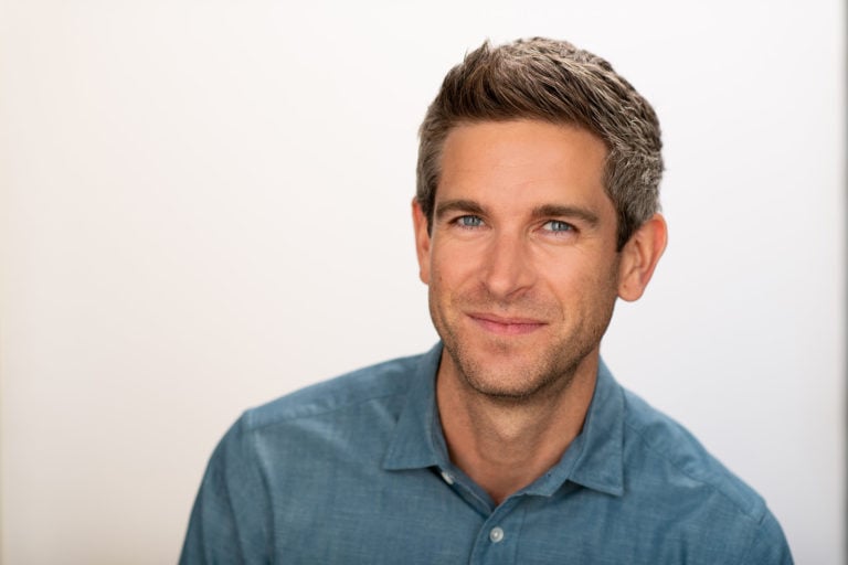 Photo of John Zeratsky on white-grey background