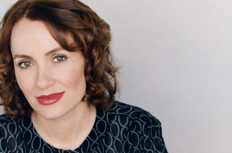Photo of Dr. Susan David on grey background