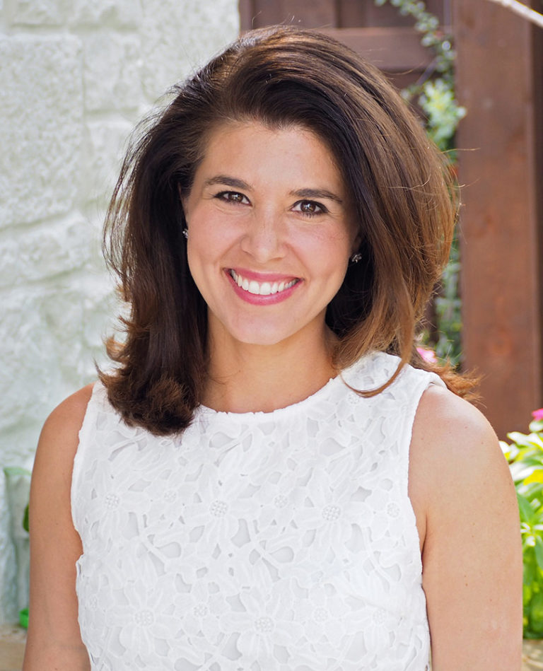 Michelle Gielan in white sleeveless top