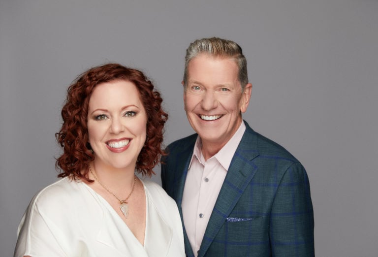 Photo of Michael and Megan Hyatt against dark grey background