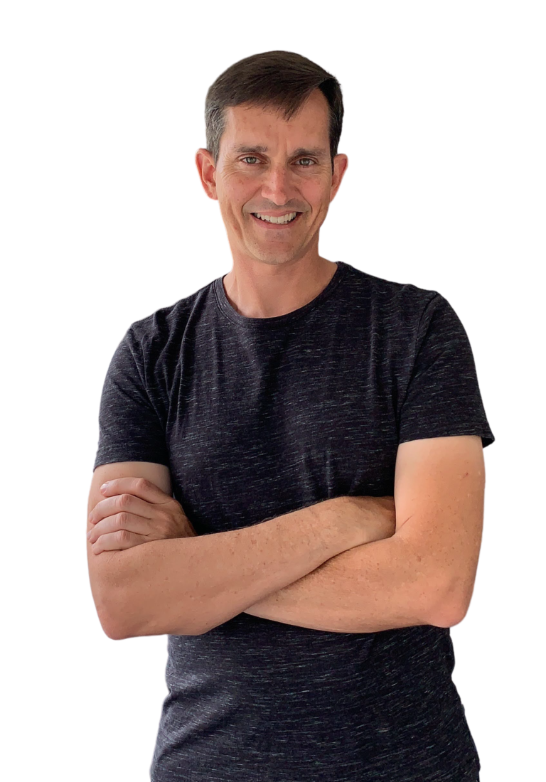 Rich Carey in a gray shirt against a white background